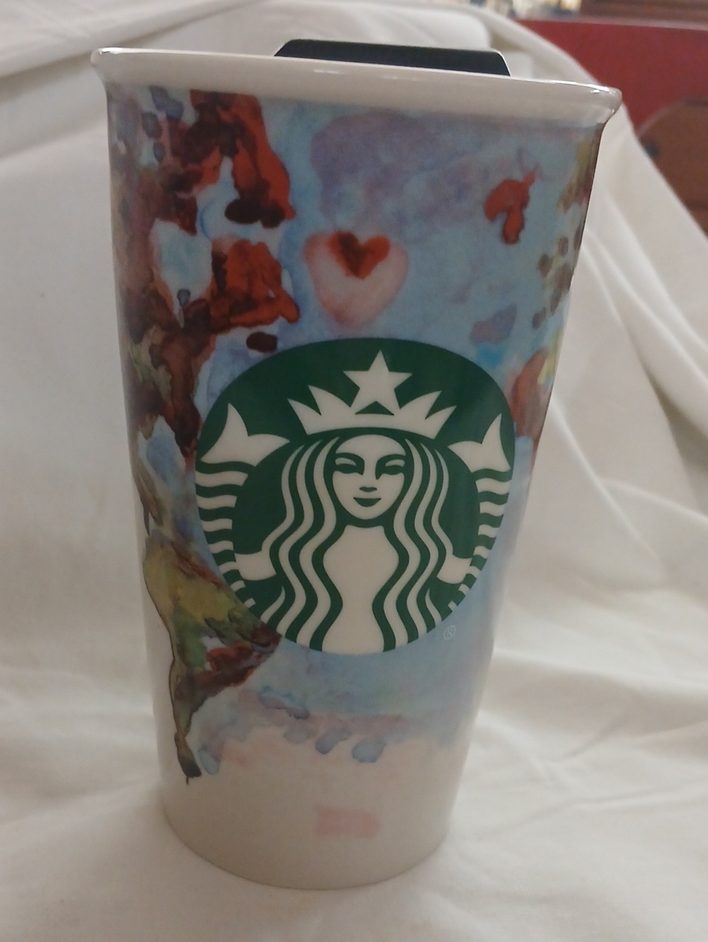 Starbucks Blue and Green Watercolor Ceramic Travel Mug with Red Accents